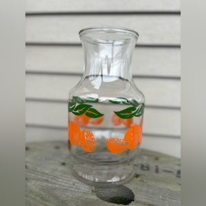 Vintage orange juice container.